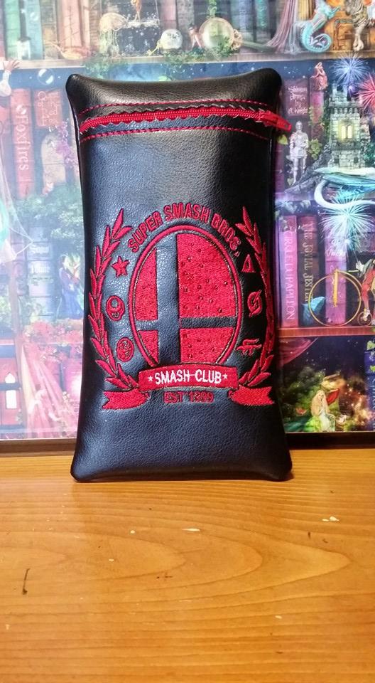 Leather case with Smash club logo embroidery design