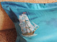 Cushion with sea ship free embroidery design