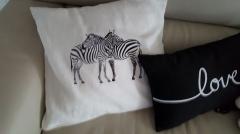 Embroidered cushion with zebra free design