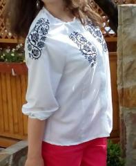 Woman's blouse with cross stitch free embroidery decoration