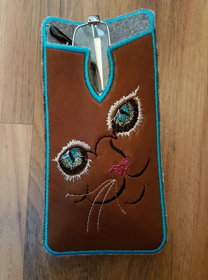 Mobile cover with cat free embroidery design