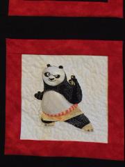 Quilt block with Panda machine embroidery design