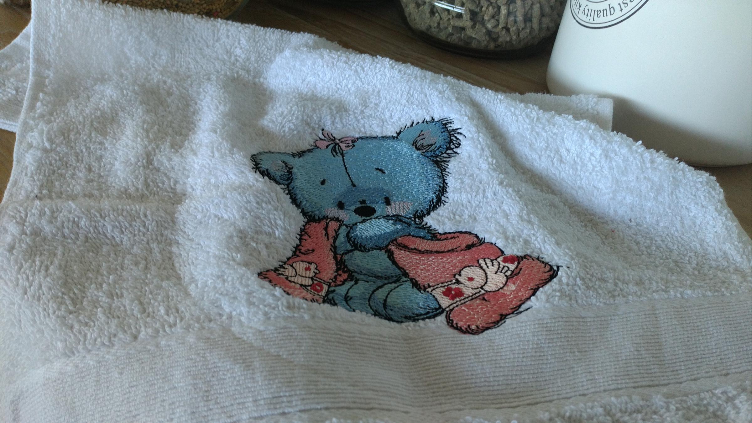 Embroidered towel with teddy bear after shower design