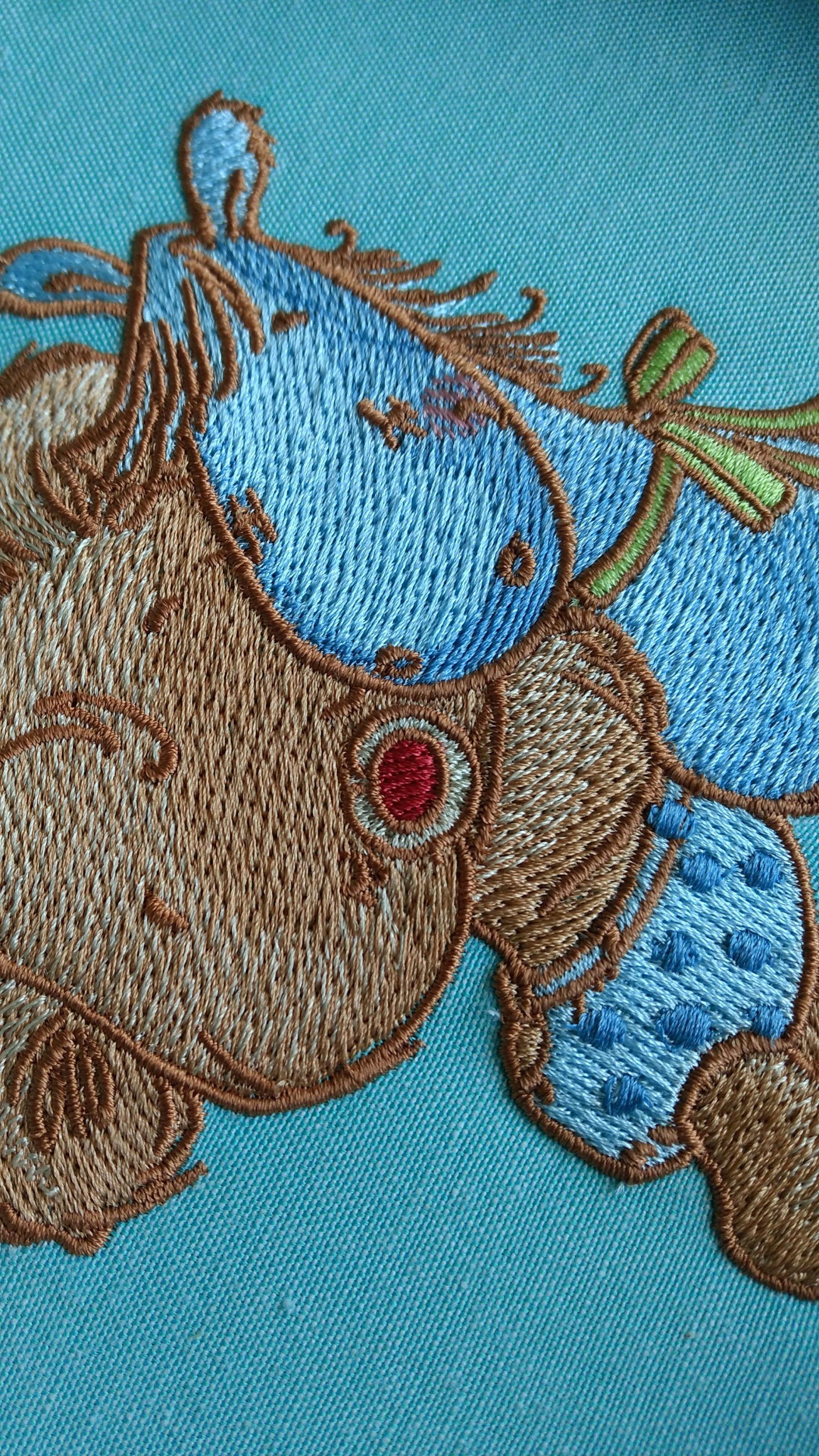 Teddy bear with pony embroidered design