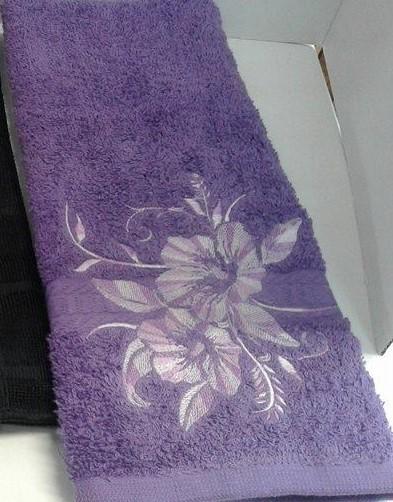 Towel with flower free embroidery design