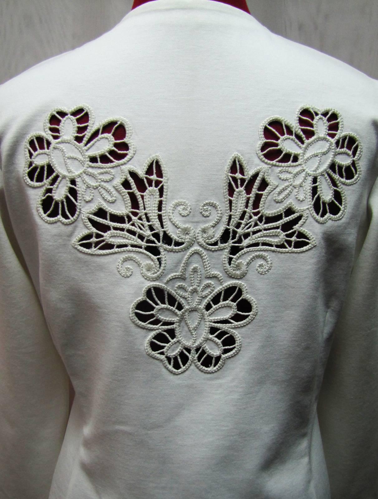 Woman's jacket with lace free embroidery design
