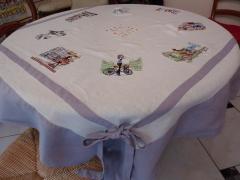 Embroidered tablecloth with city view designs