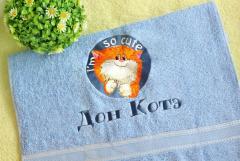 Embroidered towel with cute cat design