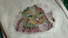 Denim patch with angry cat free embroidery design