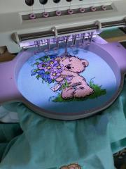 Teddy bear with bouquet embroidery design