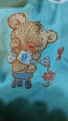 Finished Teddy bear watering can embroidery design