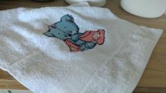 Towel with teddy bear embroidery design