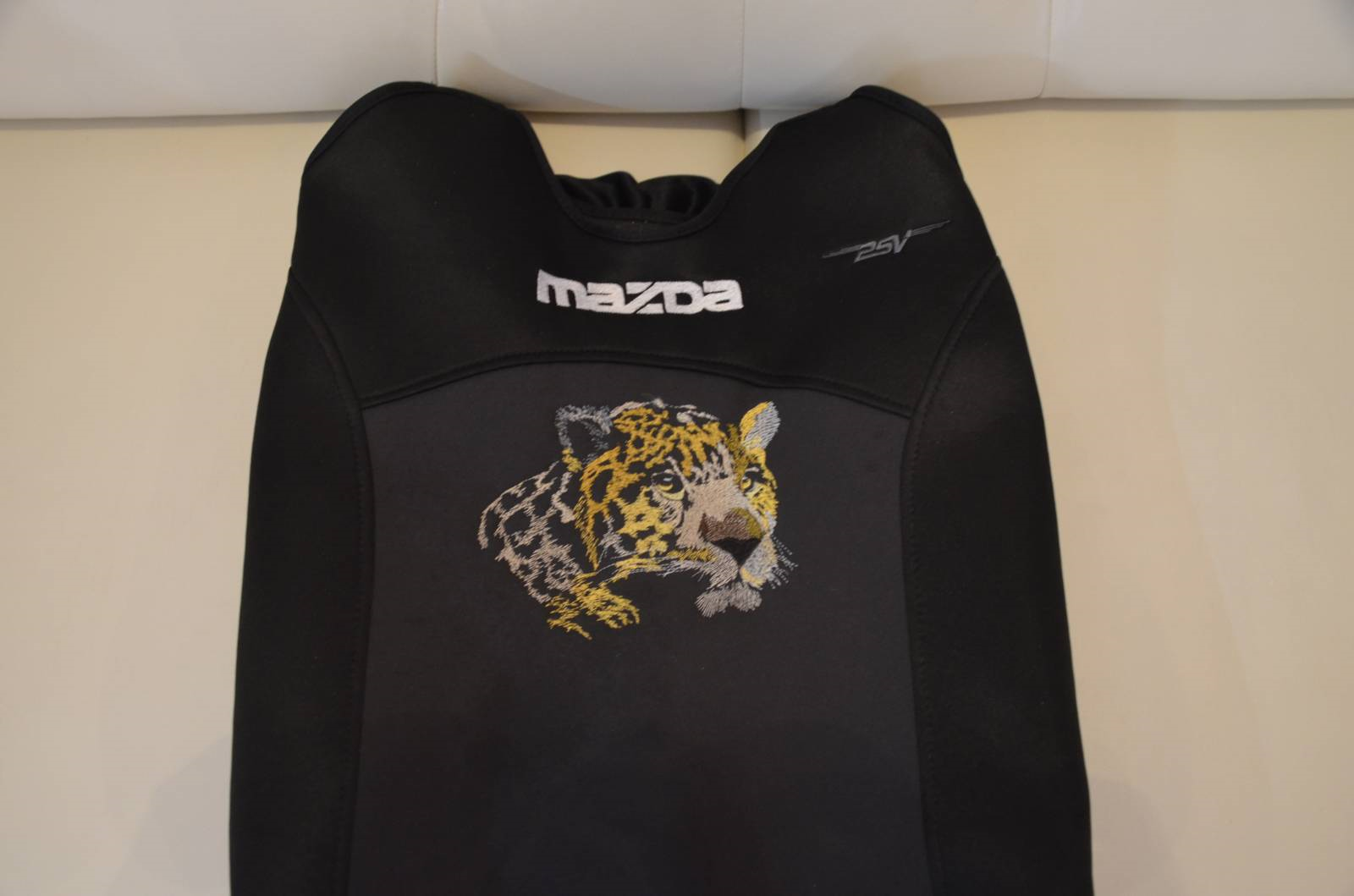 Car seat cover with embroidered leopard machine embroidery design