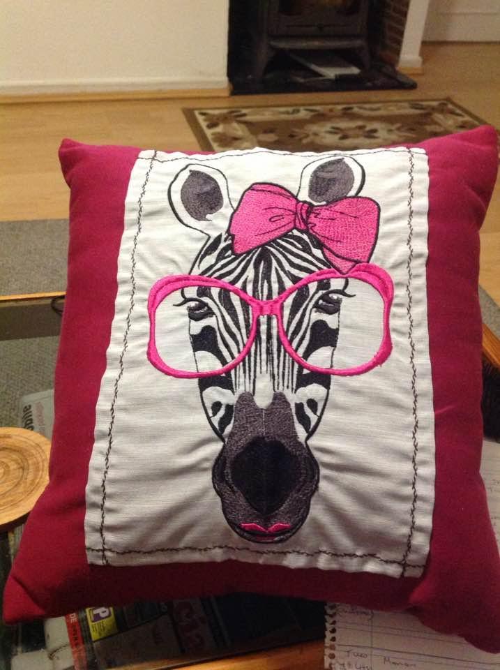 Cushion with zebra free embroidery design