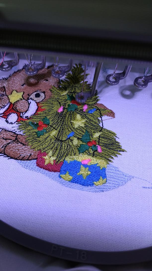 Embroidering bear and Christmas tree design