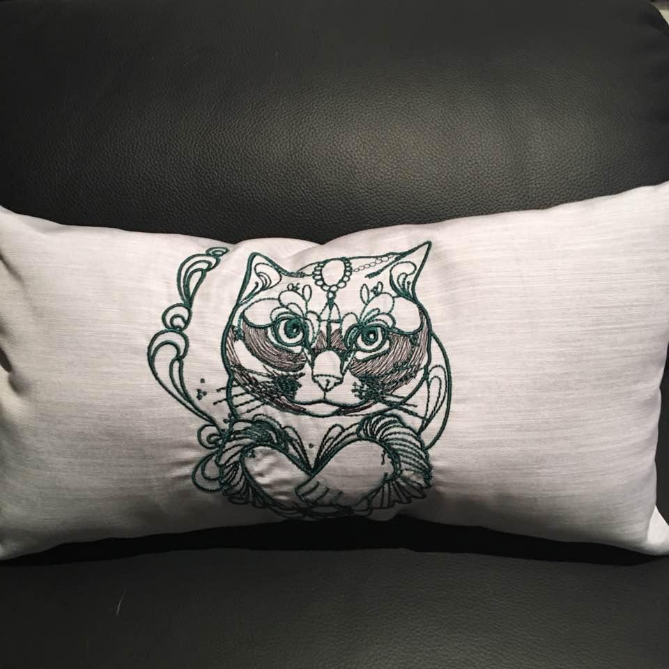 Cushion with noble cat embroidery design