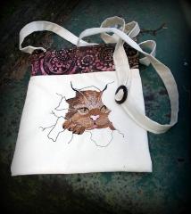 Transform Your Bag with the Angry Cat Free Embroidery Design