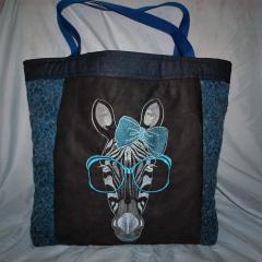 TransformTextile Bag with Eye-Catching Zebra Free Embroidery Design