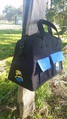 Transforming an Ordinary Black Bag with Cartoon Hero Embroidery