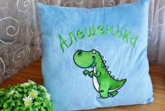 Cushion with Dinosaur sneaks embroidery design