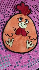 Embroidered potholder with funny chicken free design