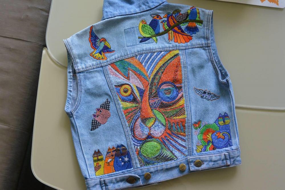 Denim jacket with modern cat embroidery design