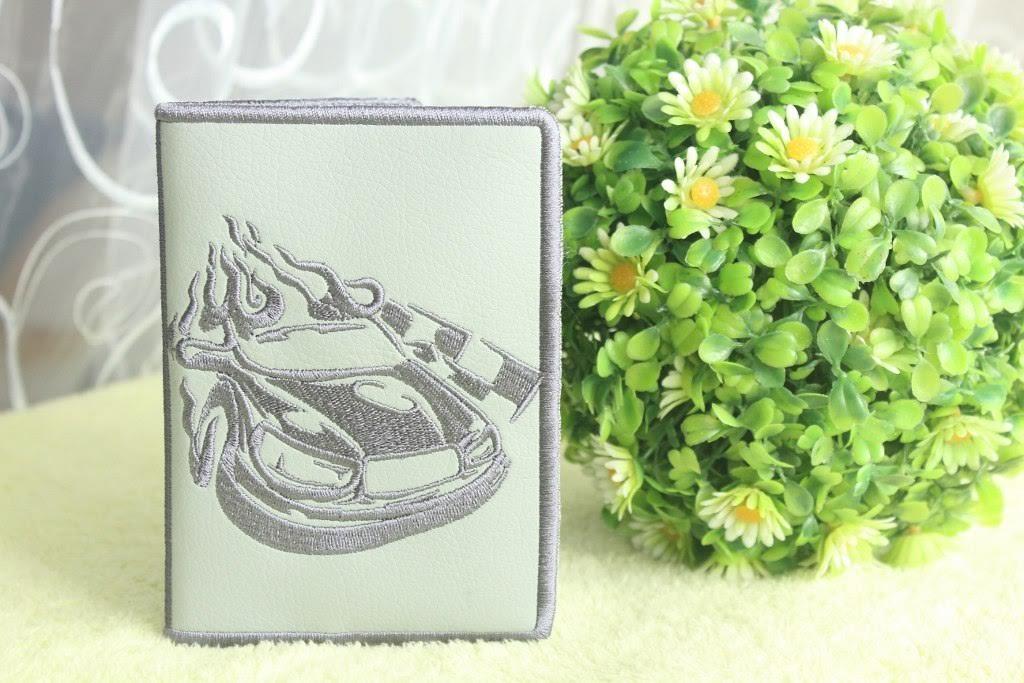 Book cover with racing car free embroidery design