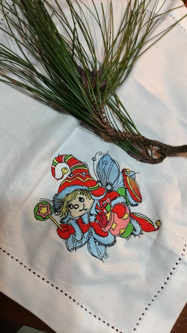 Embroidered napkin with Christmas elf design