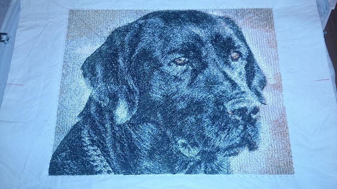 Embroidered picture with black dog free design