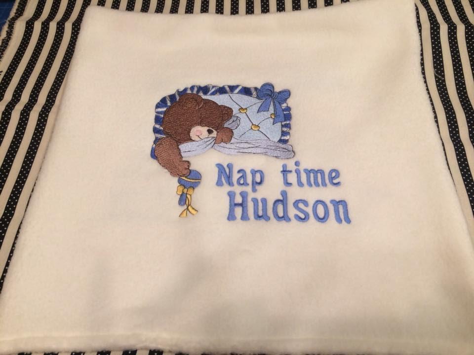 Embroidered pillowcase with sleeping bear design