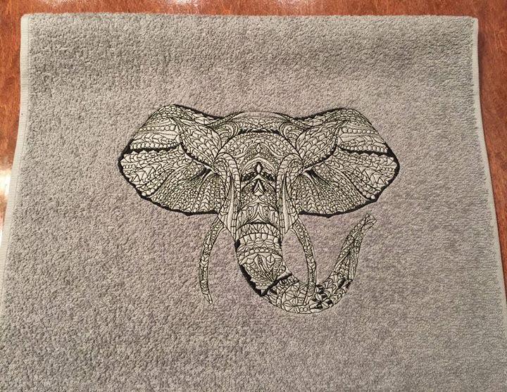 Embroidered towel with lace elephant design