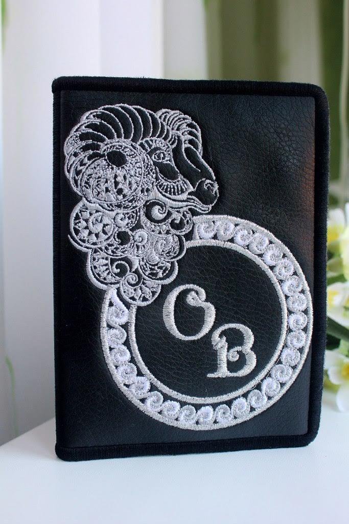 Embroidered wallet with ram head design