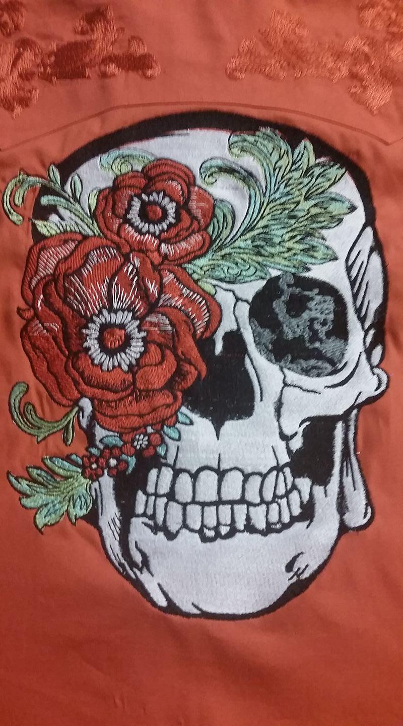 Skull and flower embroidery design