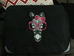 Striking Patterns: Zebra Free Embroidery Design for Laptop Bags