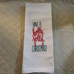 Towel with embroidered phrase Have a Holly Jolly Christmas machine embroidery design