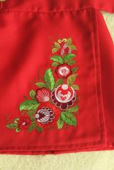 Detail of embroidered apron with flowers design