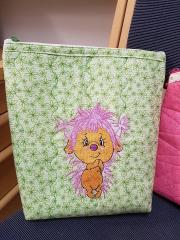 Embroidered bag with funny hedgehog design
