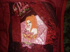 Embroidered bed cover with autumn fairy design