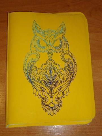 Cover with embroidered owl machine embroidery design