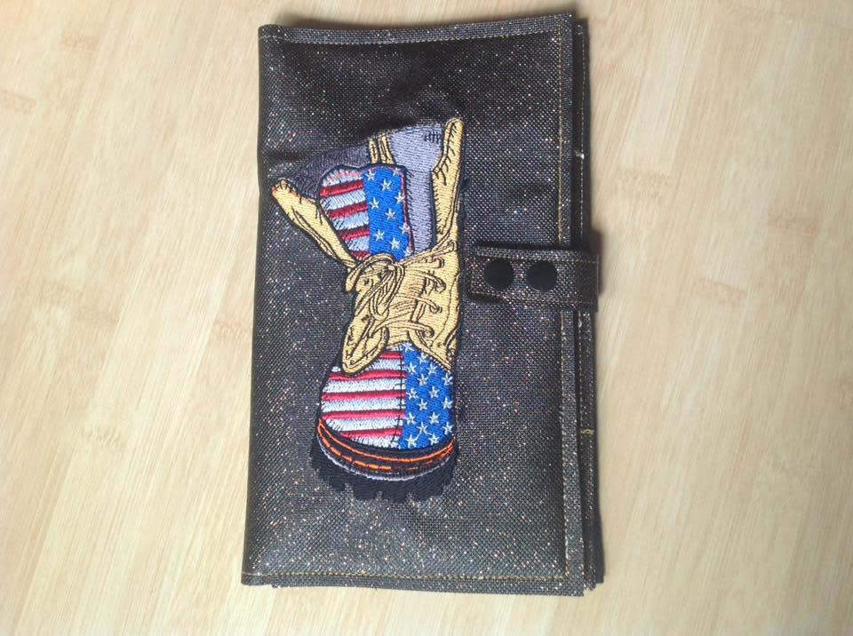 Embroidered book cover with American military boot design