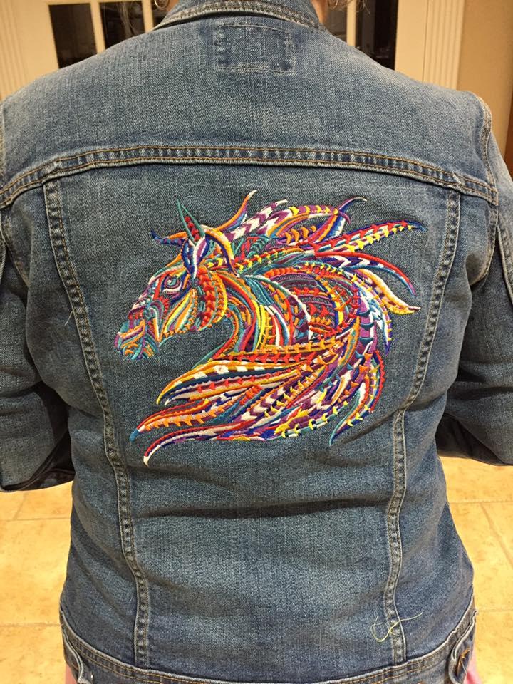 Embroidered jeans jacket with mosaic horse design