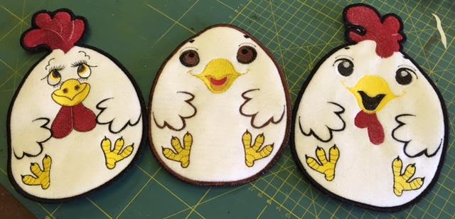 Embroidered potholders with funny chickens free applique design