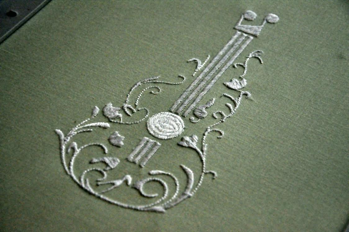 Floral guitar embroidery design