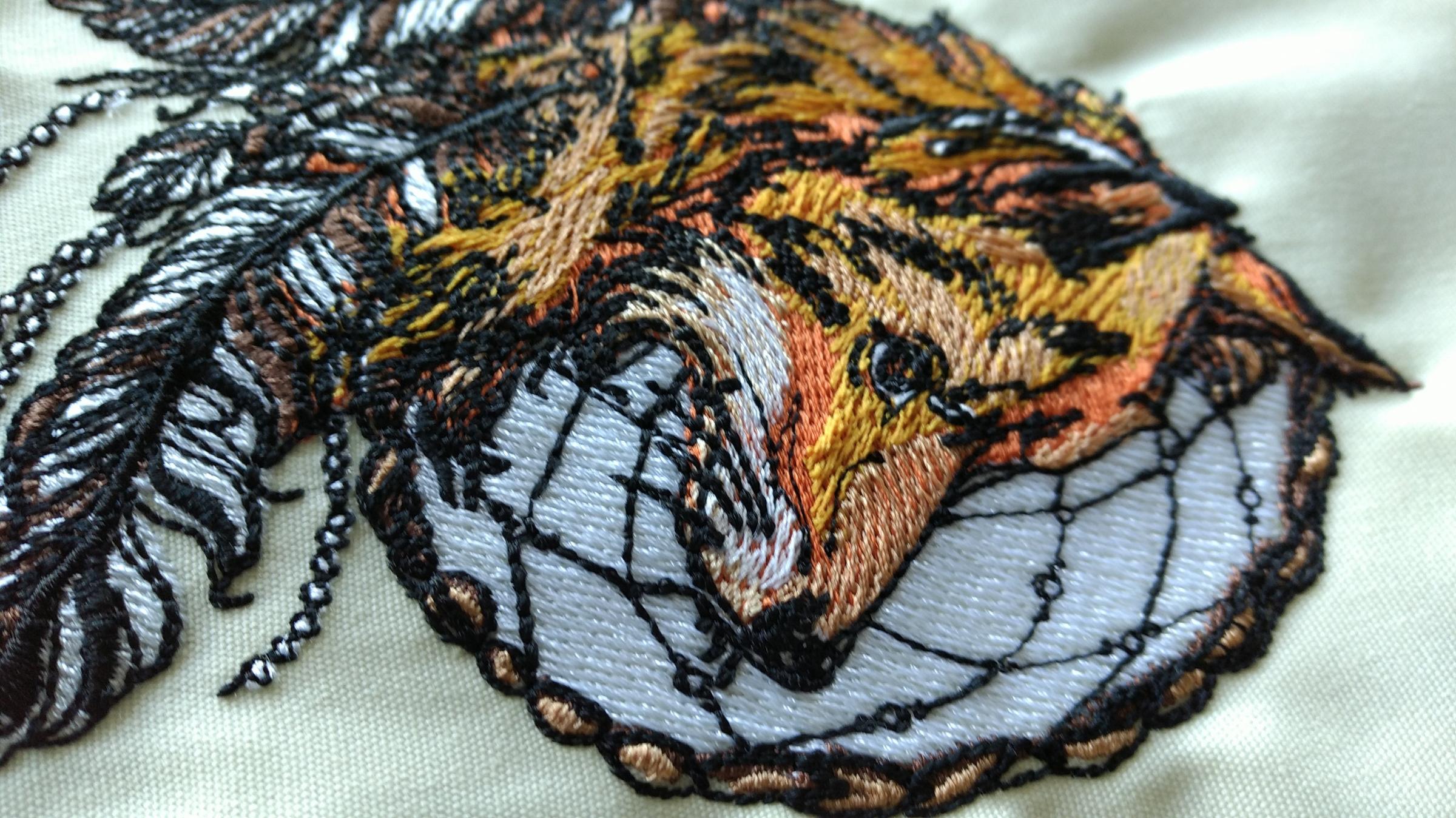 Fragment of fox and dreamcatcher embroidery design