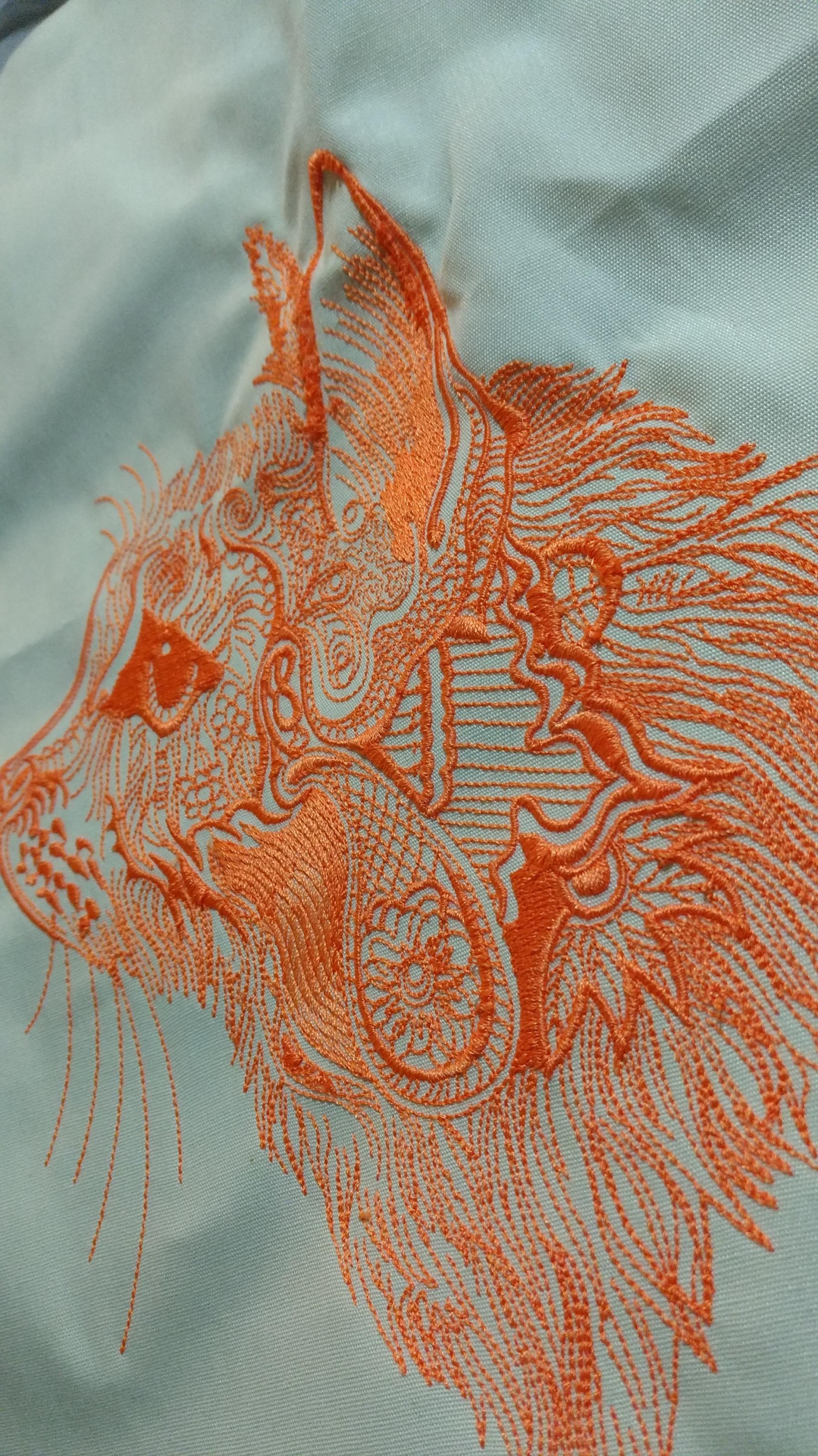 Orange lace cat embroidery design