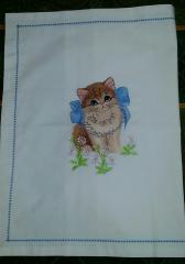 Emrboidered napkin with kitty and bow design
