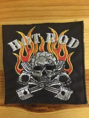 Embroidered patch with skull in fire design