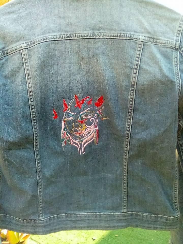 Embroidered jacket with face of tribal lady design