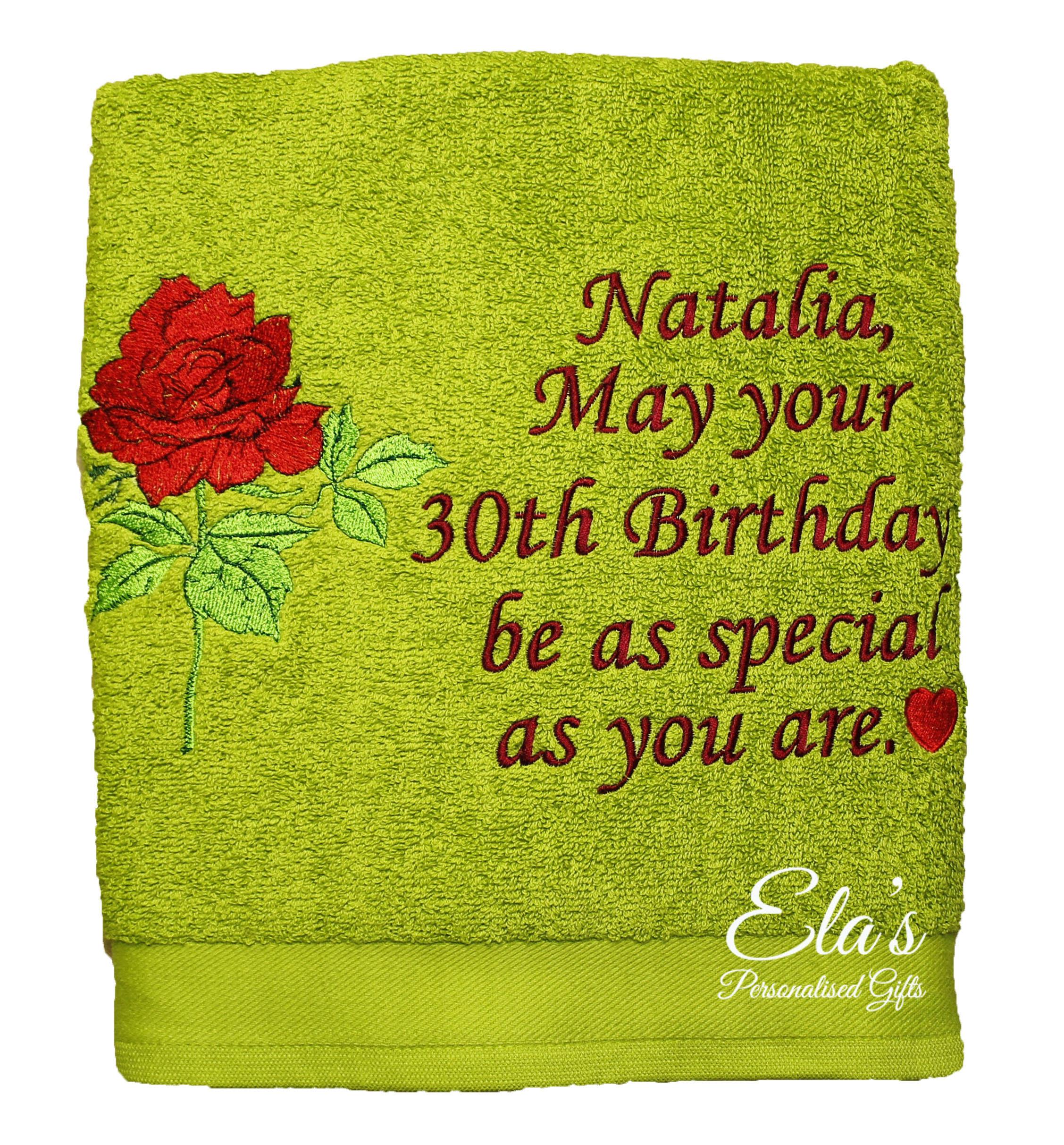 Embroidered towel with red rose design