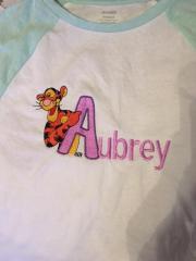 Summer baby outgit with embroidered free Tigger design and Aubrey name